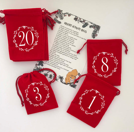 Red Advent Bags with activity list to help you plan an advent activity calendar ready for the countdown to Christmas